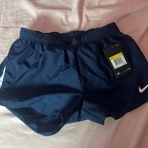 small nike blue dry fit running shorts